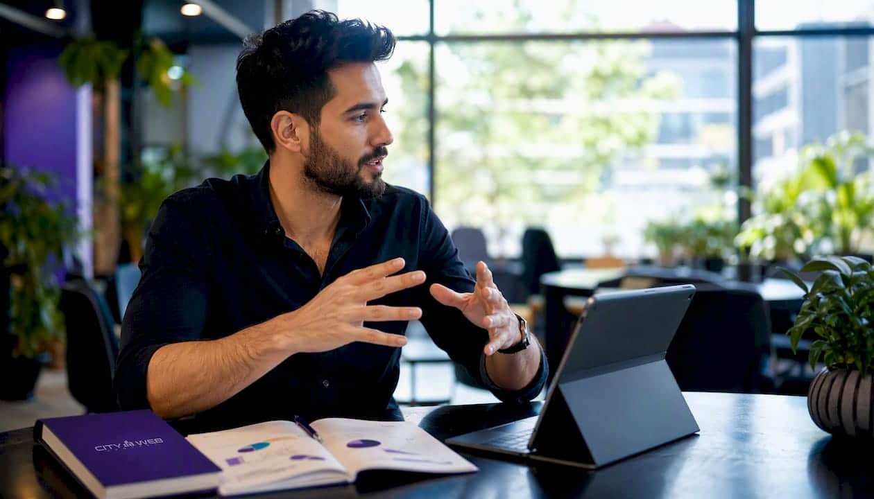 Hands over tablet analyzing streaming ad metrics