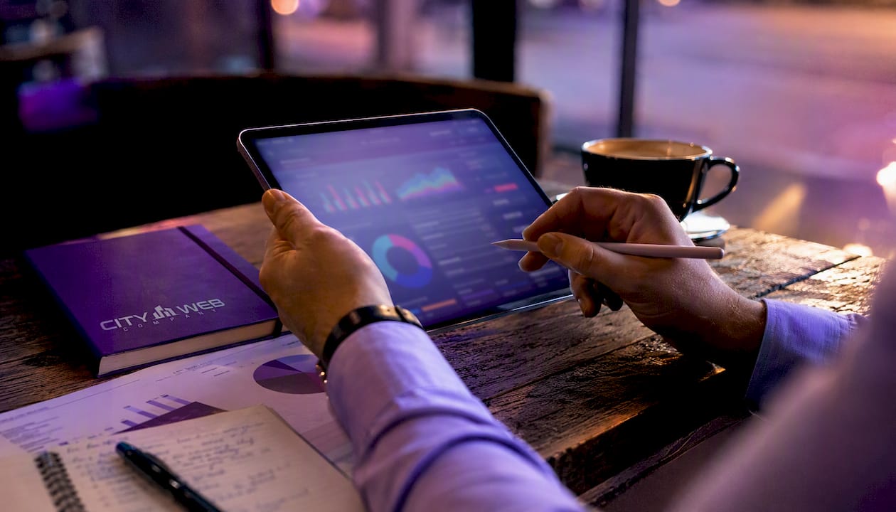 Hands managing local citation audit on tablet