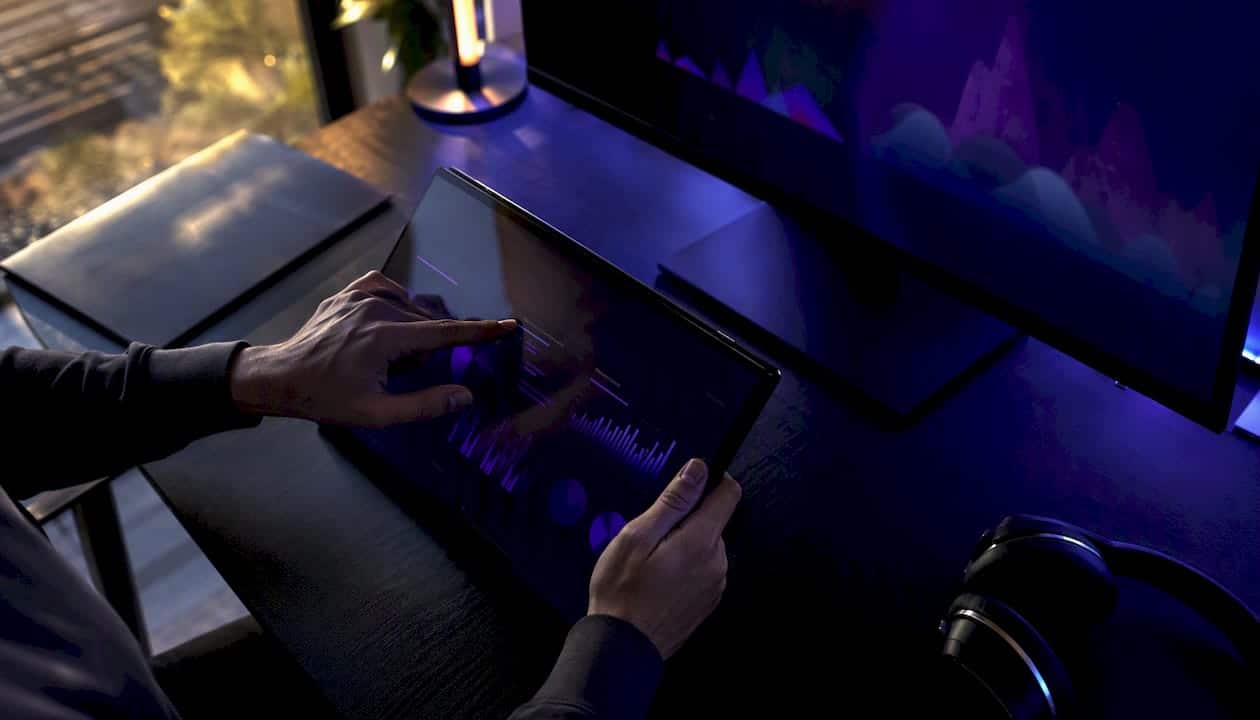 Hands controlling marketing campaign settings physically