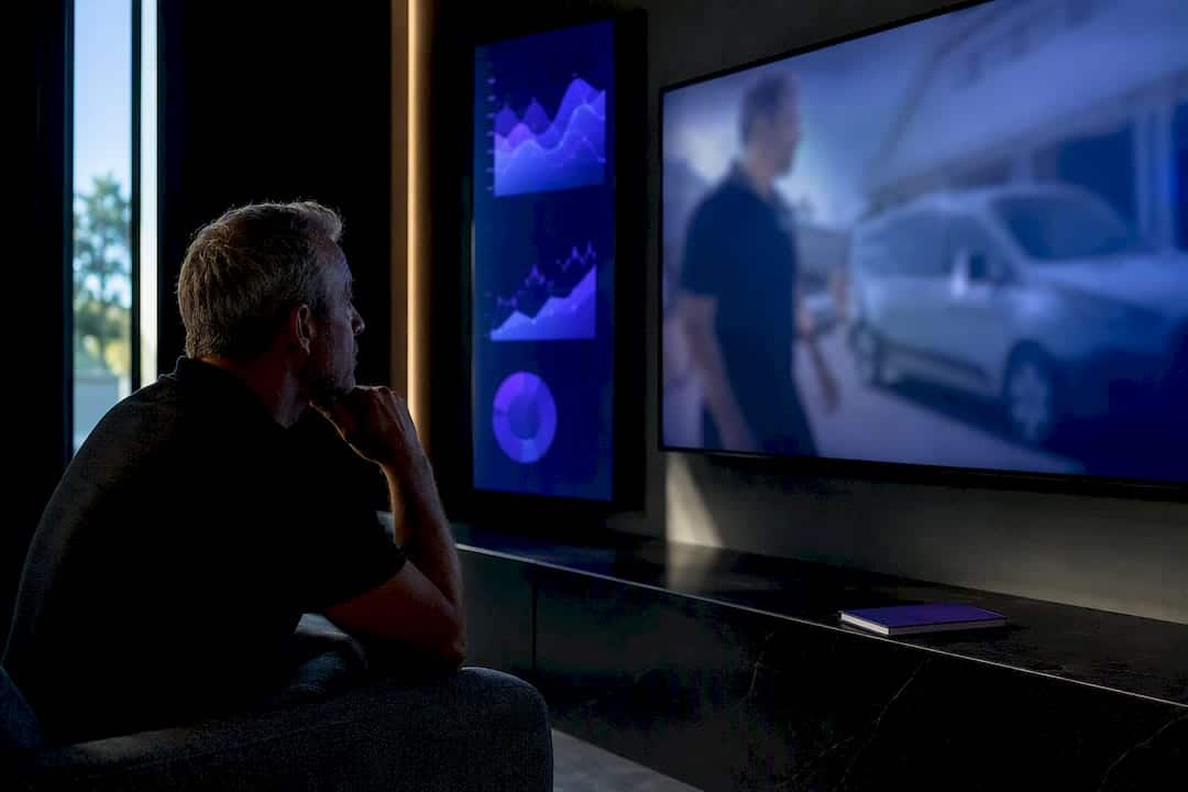 Business owner reviewing streaming TV campaign results